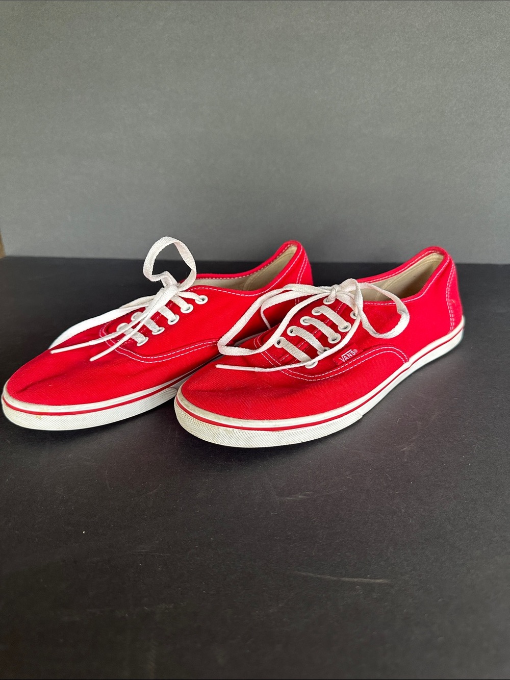 Vans red and white sneakers men’s size 7/ women’s size 6.5